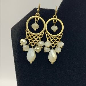 Goldtone filigree earrings with white beads. Pre-loved